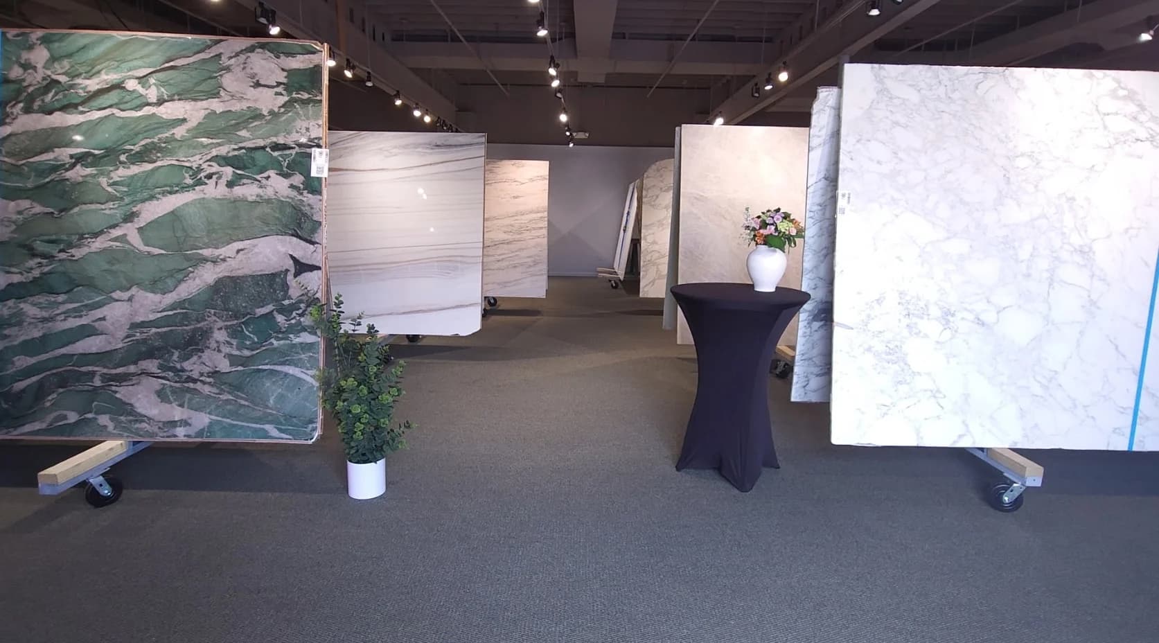 Large marble and stone slabs arranged in a material gallery